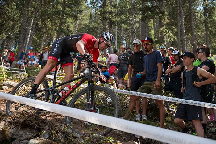 Crowd watching Silverback rider, cycle throw rough terrain in 2018 World Cup mtb competition